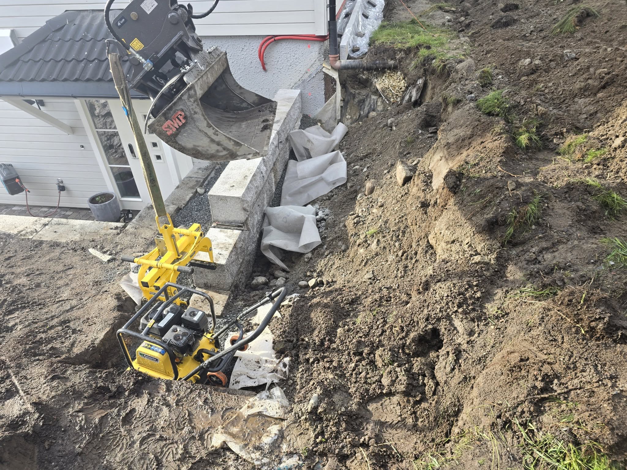 Steinmur og landskapsarbeid